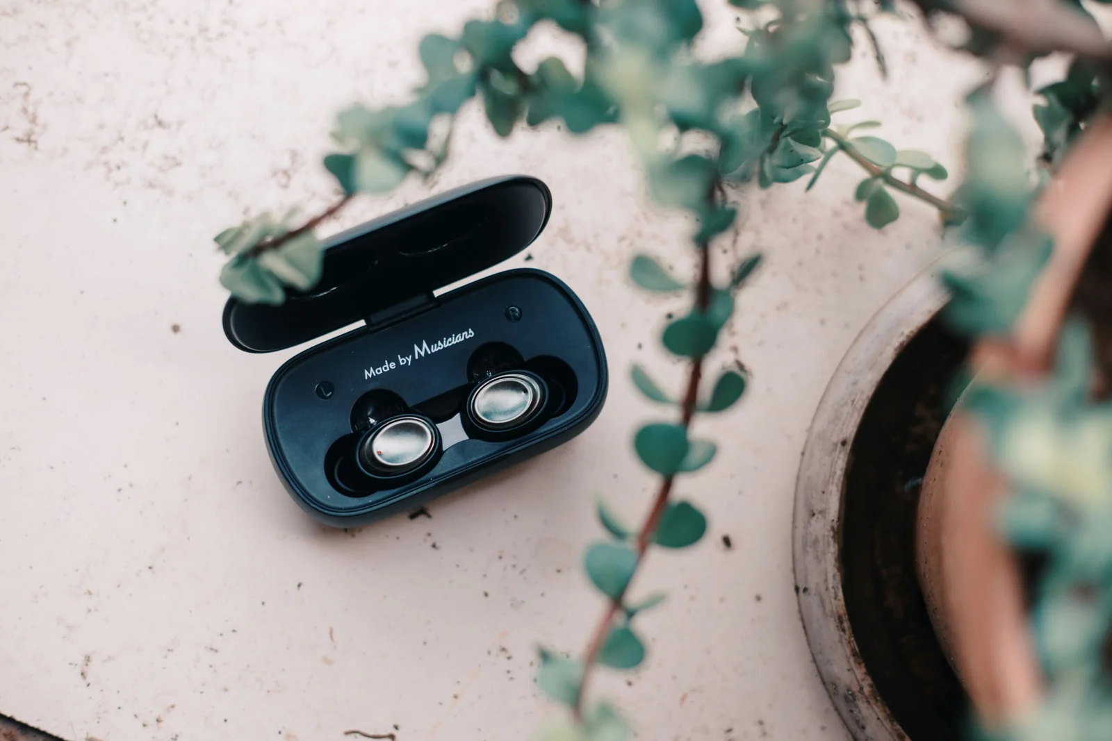 a pair of headphones sitting on top of a table