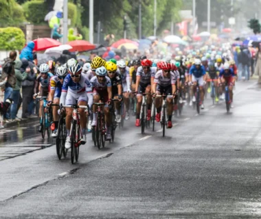 people riding bicycle on road during daytime